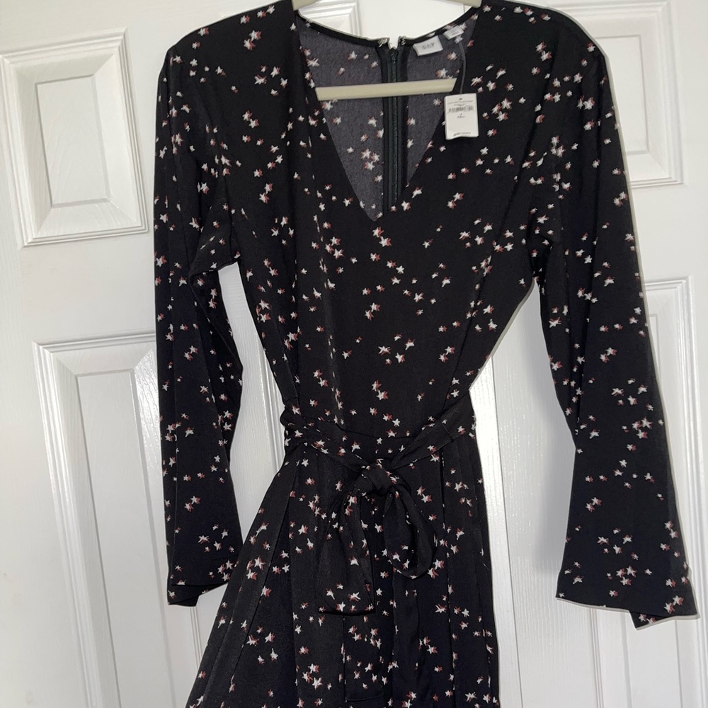 Gap wide legged jumpsuit, flared arms, with a tie belted waisted.